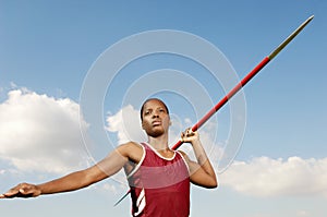 Female Athlete Throwing Javelin photo