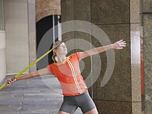 Female Athlete Throwing Javelin In Portico