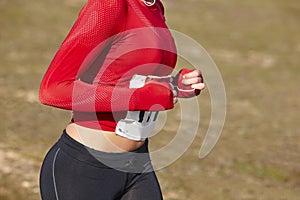 Female athletic runner on a cross country race. Outdoor circuit