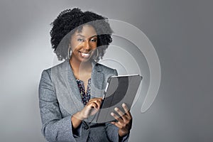 Female Author or Businesswoman Keynote Speaker with Tablet photo