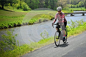 Female baby boomer enjoying e-bike ride