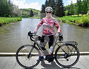 Female baby boomer enjoying e-bike ride