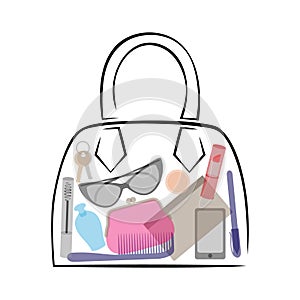 Female bag with contents. Cosmetic accessories and personal item photo