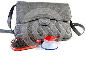 Female bag and cosmetics isolated