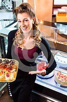 Female baker in confectionery