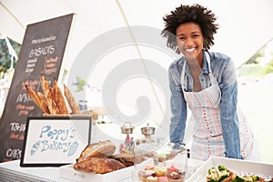 Female Bakery Stall Holder At Farmers Fresh Food Market photo
