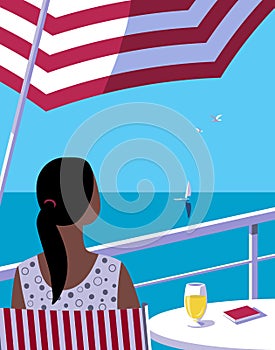 Female on balcony enjoys seaside landscape