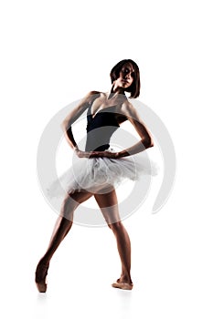 Female ballet dancer wearing tutu. Prima ballerina posing on white background