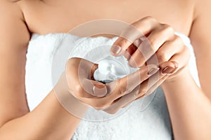 Female beautiful well-groomed hands with shaving foam close-up. Body care, personal hygiene, female beauty
