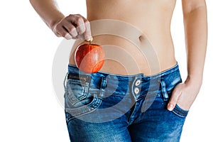 Female belly. Woman Hands holding red apple. IVF, pregnancy, diet concept.