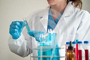 Female biotechnologist testing new chemical substances in a laboratory