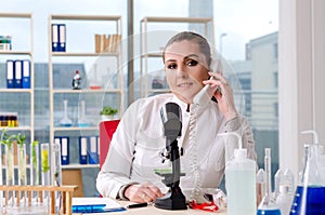 The female biotechnology scientist chemist working in the lab