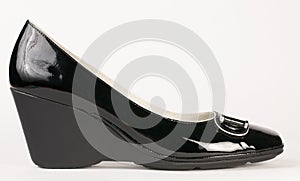 Female black varnish shoes