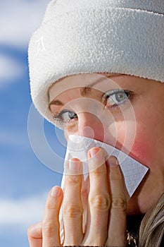 Female blowing nose