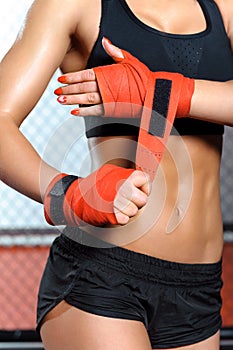 Female boxer does bandage