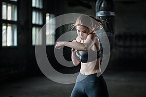 Female Boxer preparing for training in Boxing Club