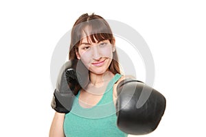 Female boxer throwing a left jab