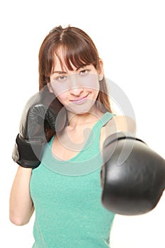 Female boxer throwing a left jab photo