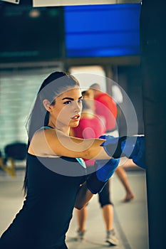 Female Boxer At Training