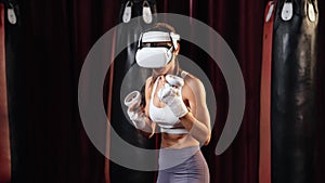 Female boxer training with VR or virtual reality. Impetus