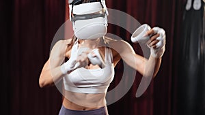 Female boxer training with VR or virtual reality. Impetus