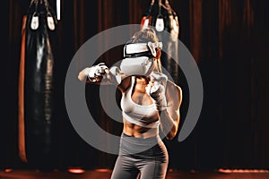 Female boxer training with VR or virtual reality. Impetus