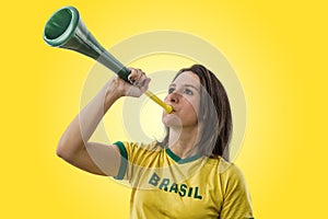 Female Brazilian fan celebrating