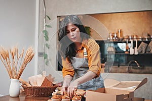 Female bread shop owner