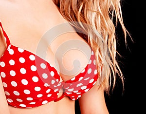 Female breast in red bra