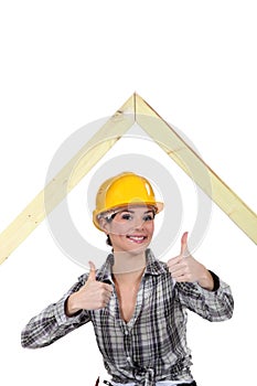 Female builder with an A-frame