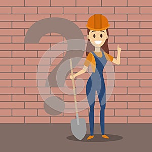 Female builder in uniform holding a shovel