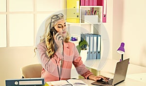 female business leader. woman sit at her desk in office. Business woman working in office with documents. Professional