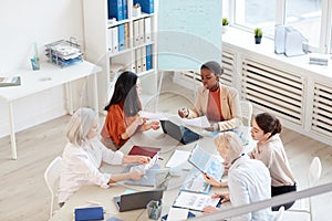 Female Business Team Meeting in Modern Office