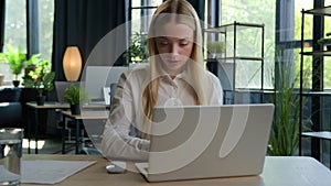 Female businesswoman Caucasian girl woman executive manager employer CEO working with laptop computer consider business