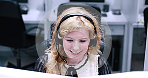 Female call centre operator doing her job