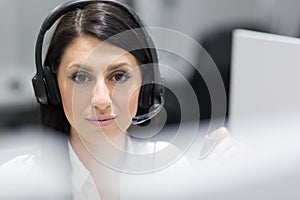 Female call centre operator doing her job