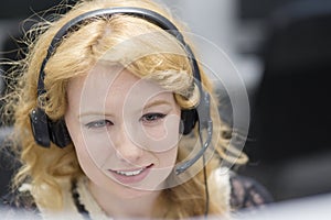 Female call centre operator doing her job