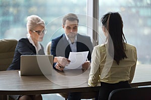 Female candidate interview with HR managers in office