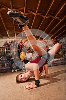 Female Capoeira Performer Kicking