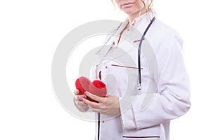 Female cardiologist with red heart.