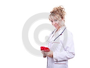 Female cardiologist with red heart.