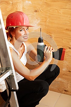 Female carpenter on duty