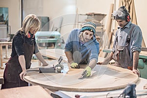 Female carpenter working in workshop