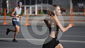Female champion run marathon. Woman runner athlete. Sport jogging. Sportswoman.
