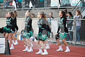 High school football cheerleaders