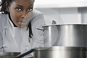 Female Chef In Kitchen