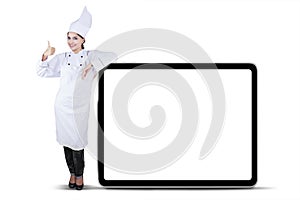 Female Chef Leaning on The Empty Board