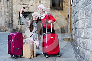 Female and child in the center taking selfie