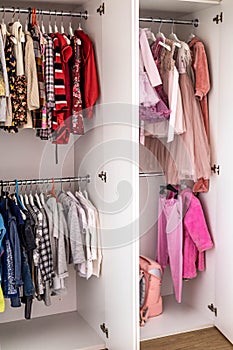 Female childish wardrobe apparel hanged comfortable vertical storage Marie Kondo minimalist method