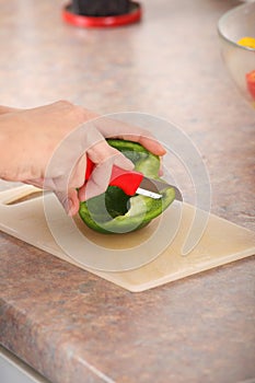 Female chopping food ingredients